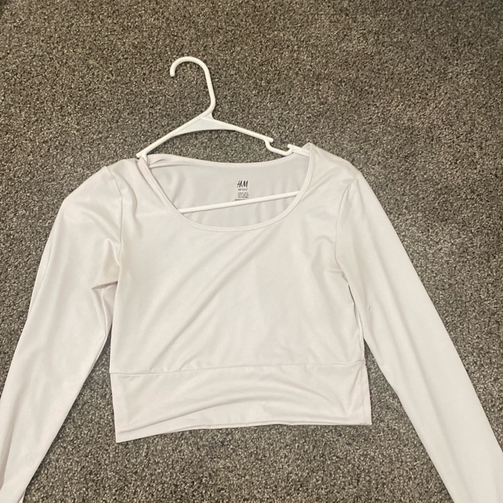 a white h&m athletic long sleeve